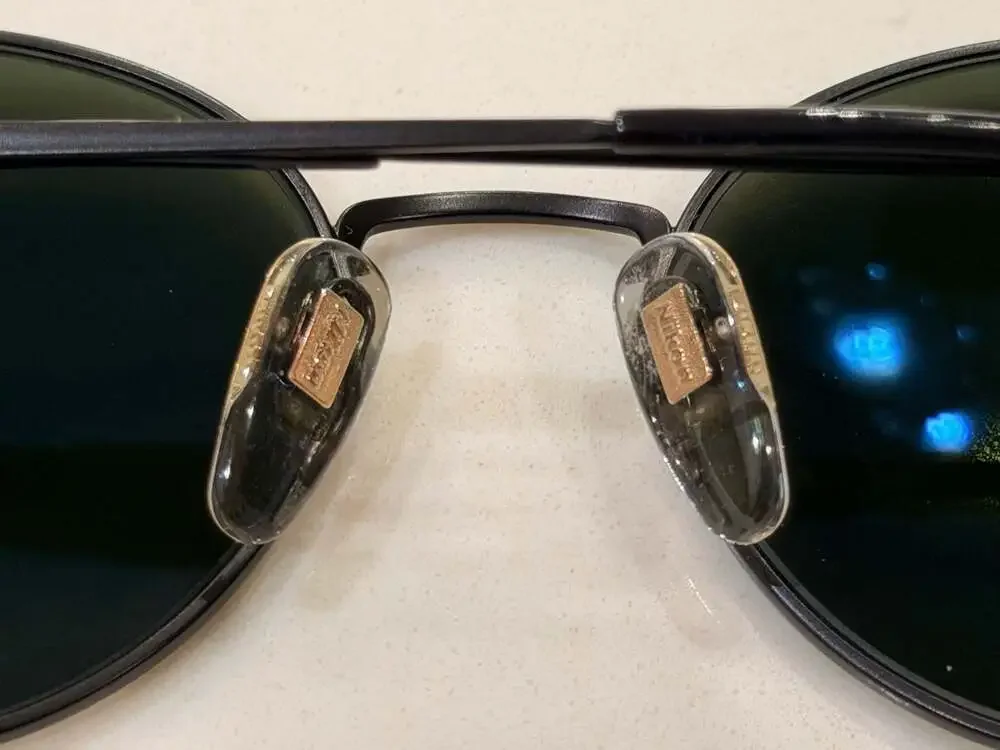 Vintage Nikon VT5801-5 Round Metal Sunglasses in Matte Black with Green Lenses